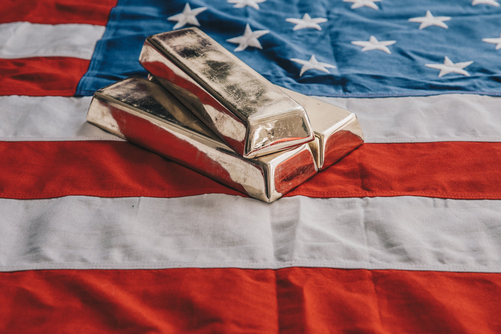 gold bars on an american flag