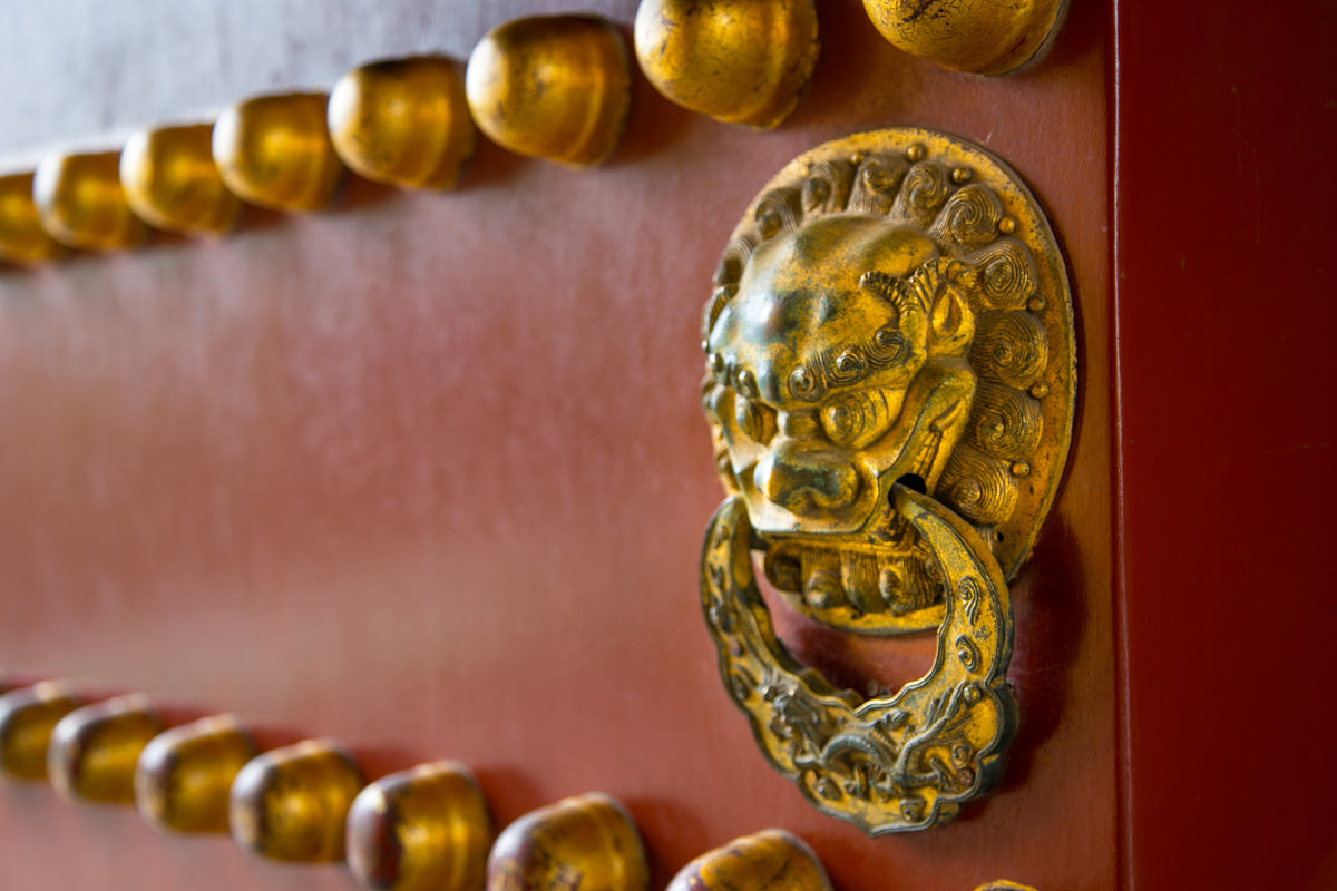 gold lion temple door knocker