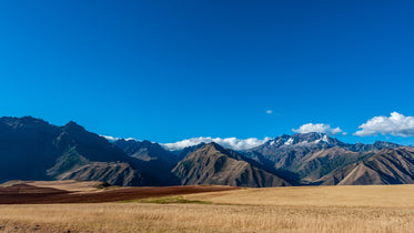 golden grasses and mighty mountains