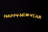 golden happy new year lettering