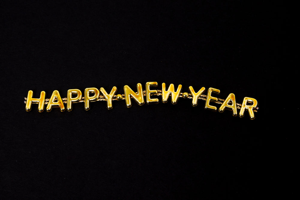 golden happy new year lettering