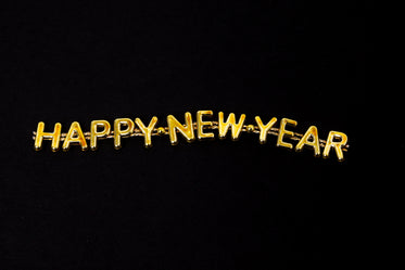 golden happy new year lettering