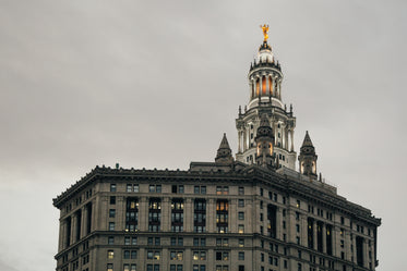 golden statue on top of tower