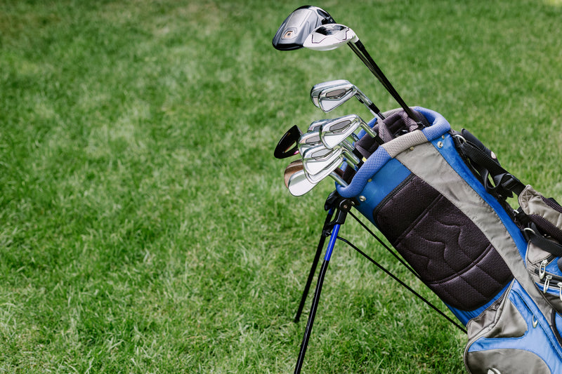 golf bag with clubs at golf course - Image of laws, A golf cart with all the required equipment (hea