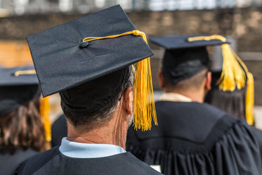 grad student wearing cap