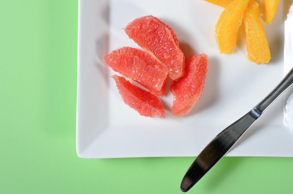 grapefruit and orange slices on a plate