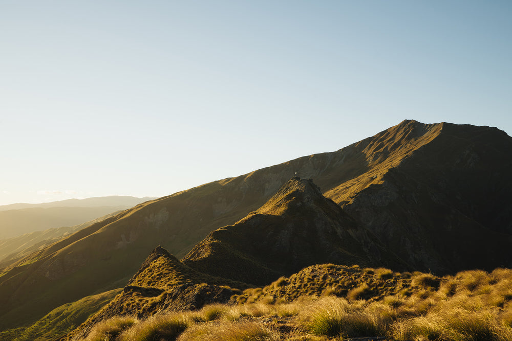 grassy sides of dry mountain range