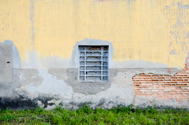 grate in plaster wall