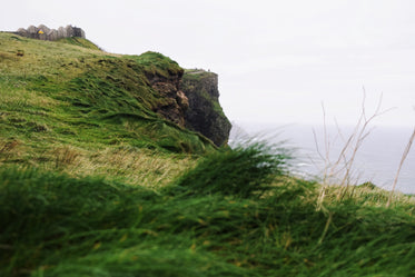green hills and irish cliffs