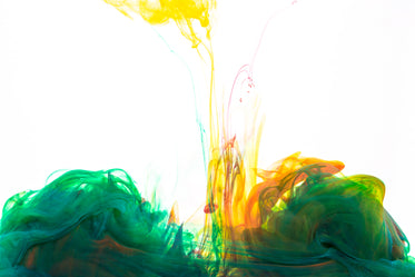 green ink with yellow and orange drop