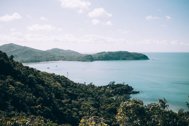 green mountains and blue water