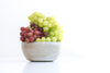 green red grapes in bowl