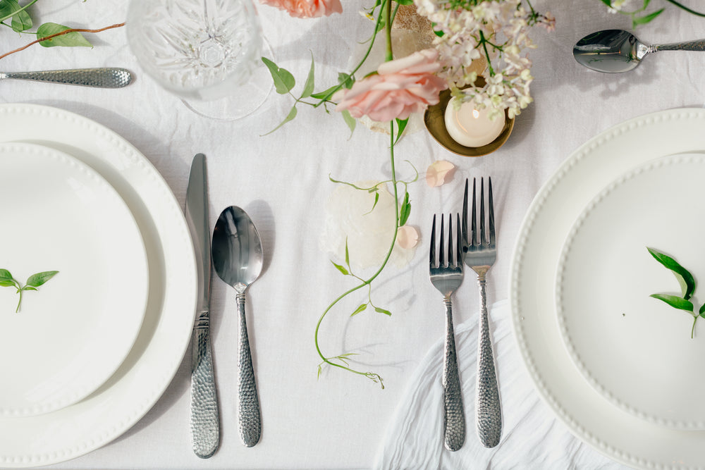 green vine between place settings