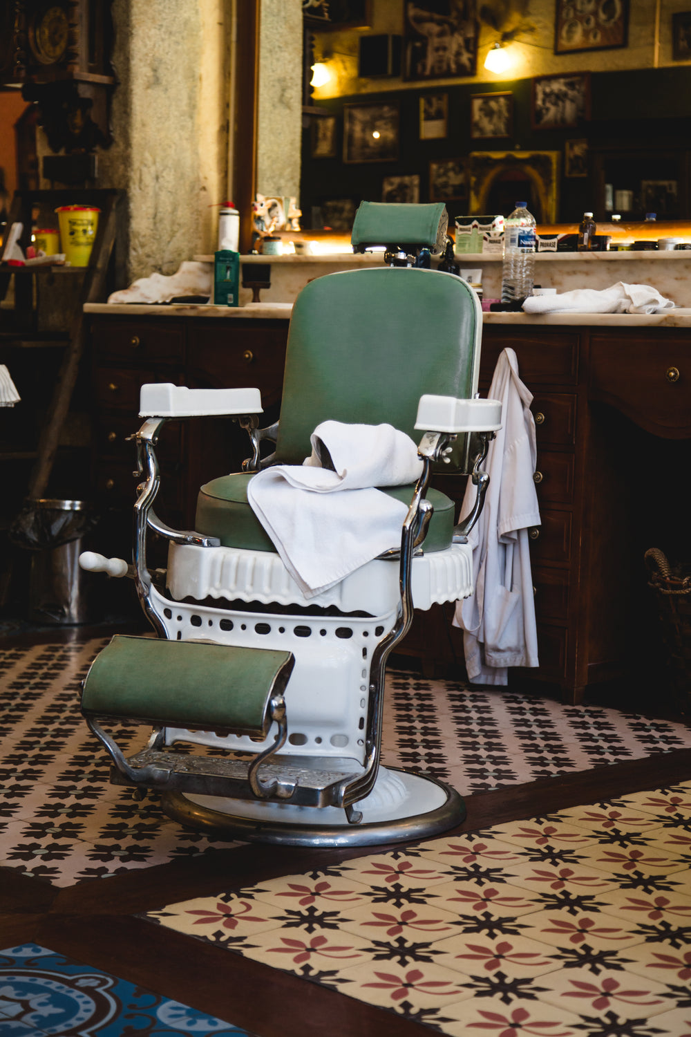green vintage chair in barbershop
