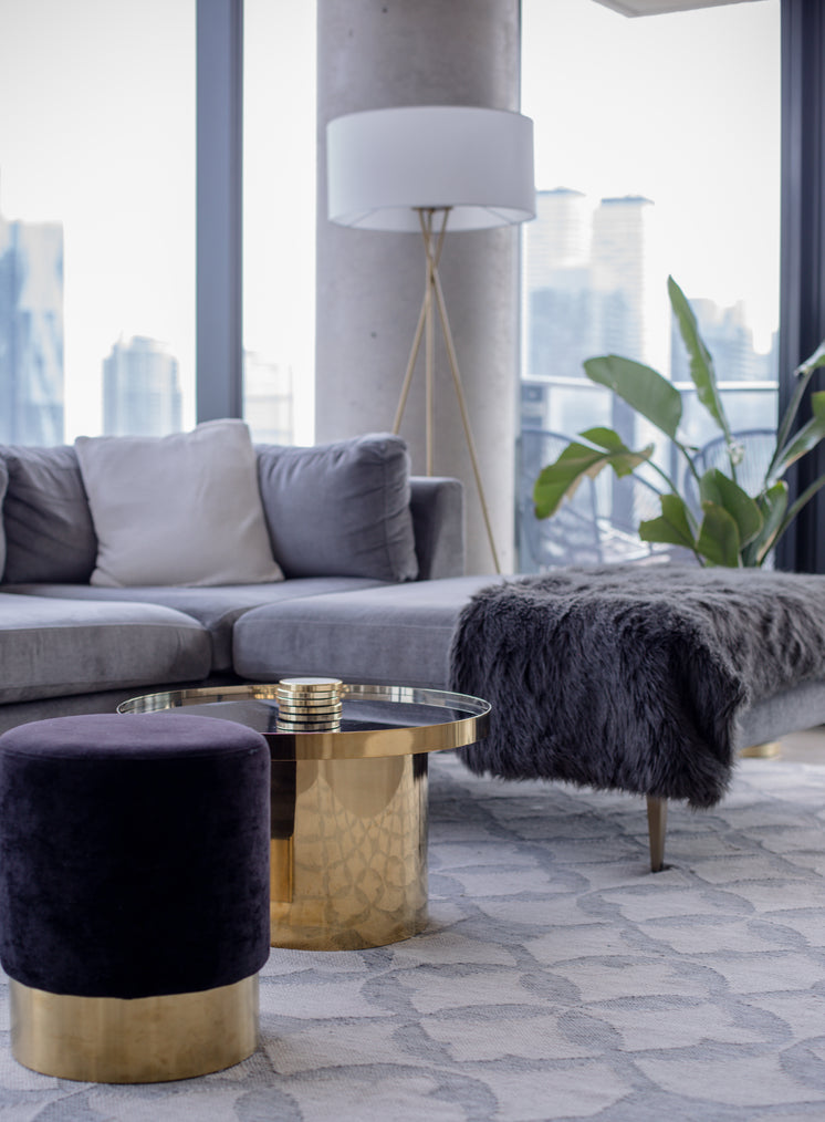 grey and gold living room interior design - Investigating the essential significance of workspace renovation in driving business performance and attaining success through purposeful implementation