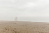 grey foggy beach
