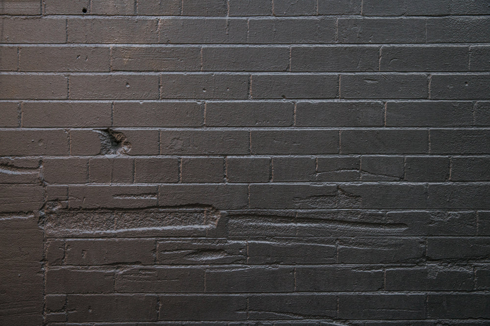 grey painted brick wall