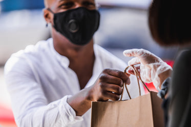 groceries safely exchanging hands