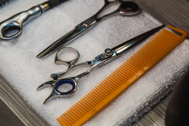 hair tools on white towel