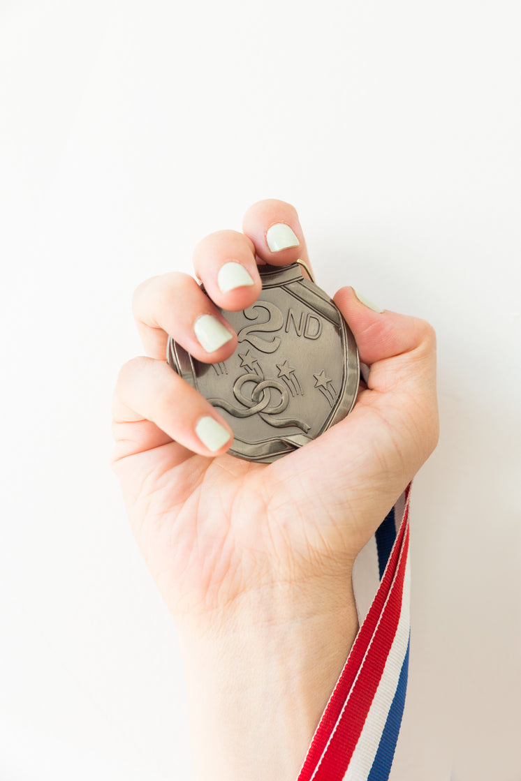 hand-holds-medal.jpg?width=746&format=pjpg&exif=0&iptc=0