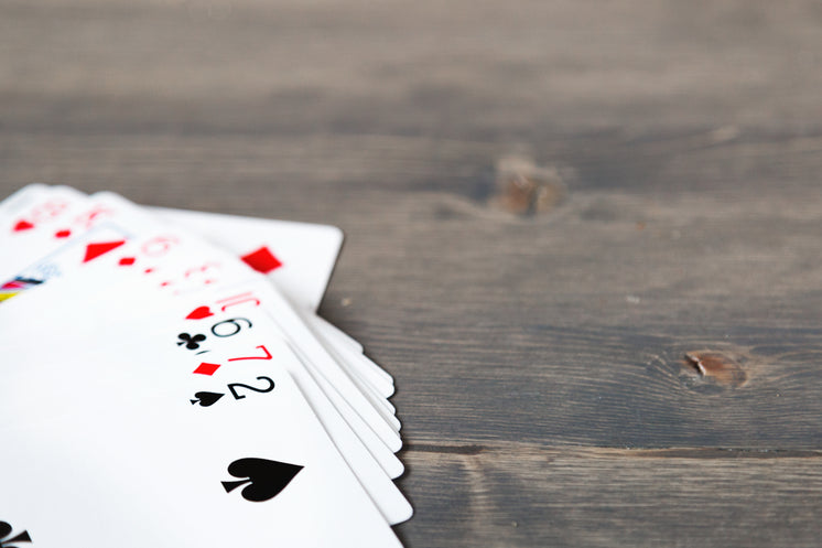 hand-of-cards-on-wood.jpg?width=746&format=pjpg&exif=0&iptc=0