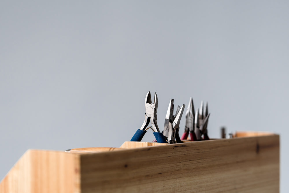 hand tools stored in wooden holder