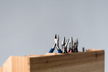 hand tools stored in wooden holder