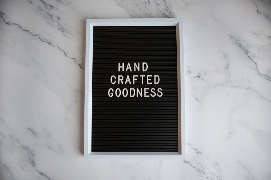 Browse Free HD Images of Handcrafted Goodness SIgn On Marble