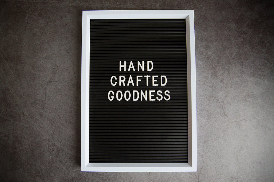 Browse Free HD Images of Handcrafted Goodness Sign On Stone