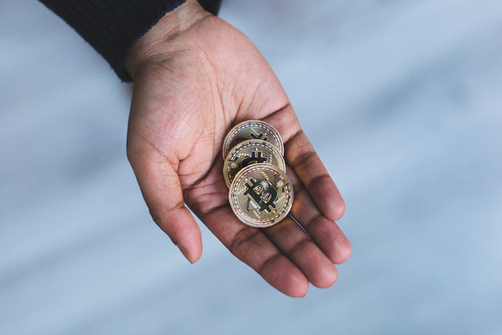 handful of bitcoin cryptocurrency