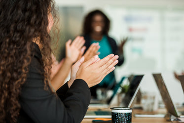 hands clapping at meeting