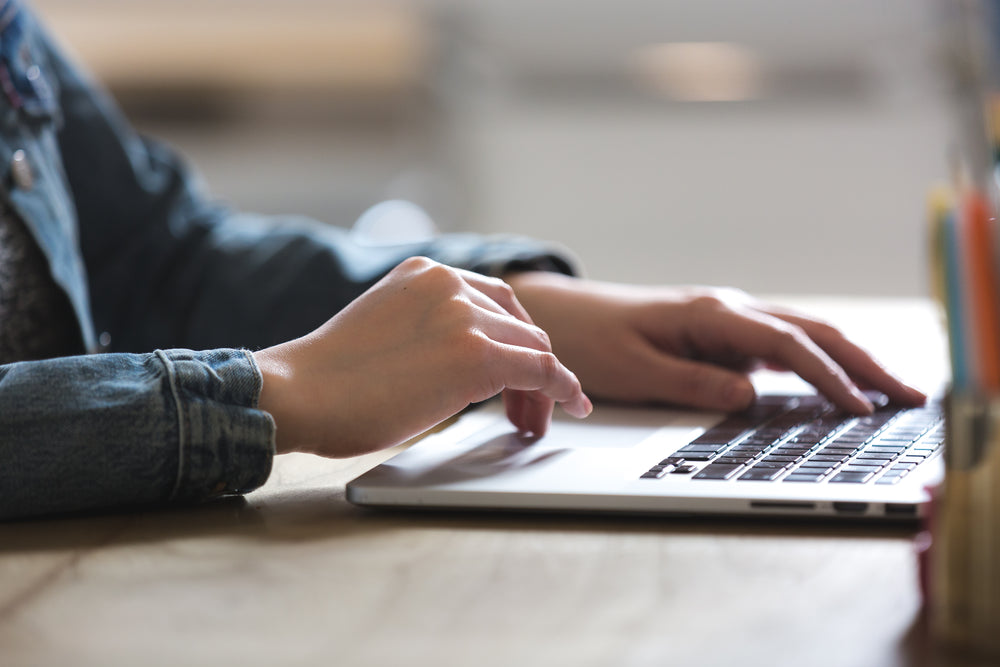 hands on trackpad