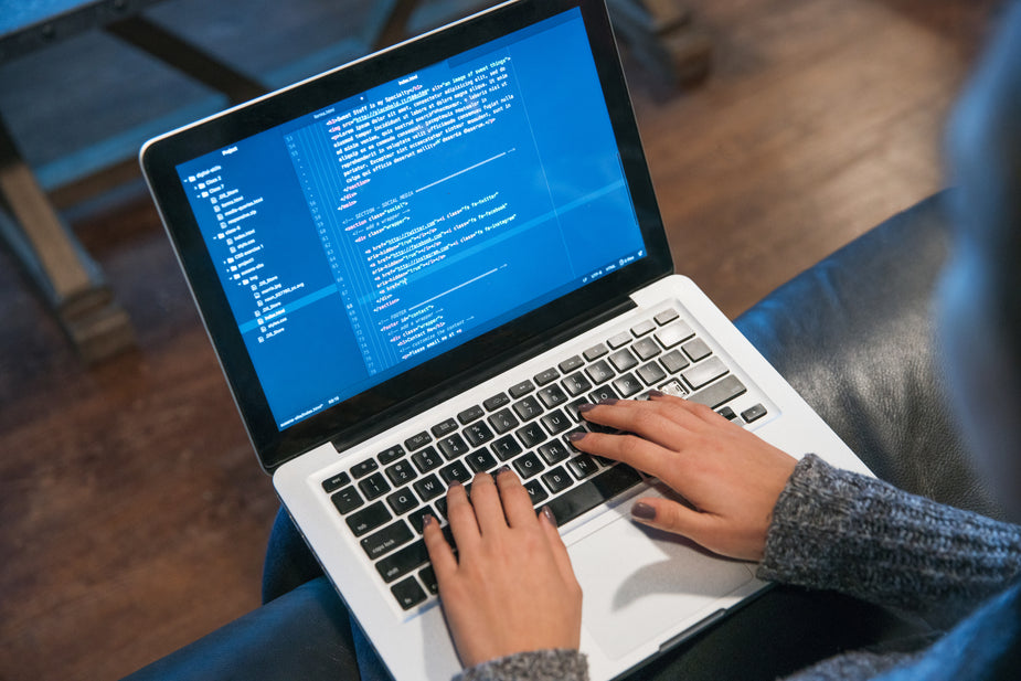 Picture of Hands Typing Code On Laptop — Free Stock Photo