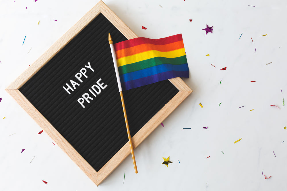 happy pride sign with flag