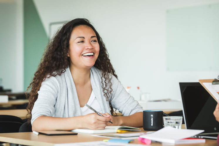 happy-woman-at-work.jpg?width=746&format