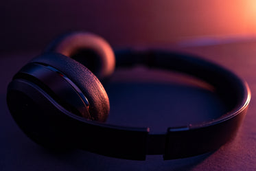 headphones in an orange glow