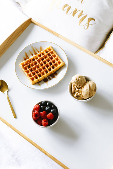 healthy and indulgent food in bed