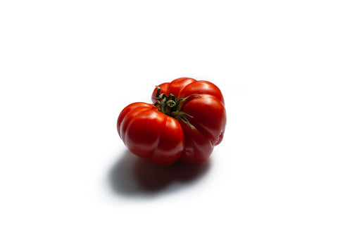 heirloom tomato on white background