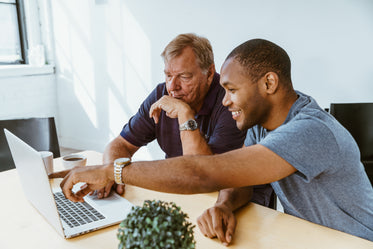 helping senior on computer