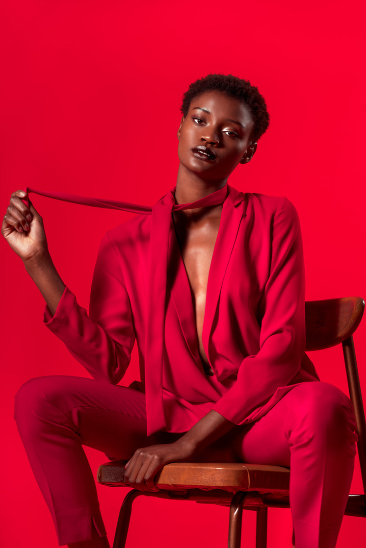 High Fashion Model In Red Suit