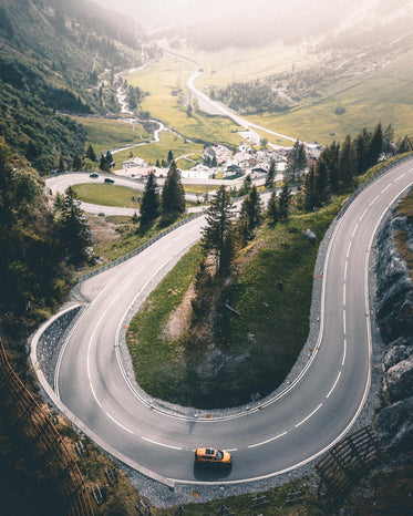 highway winding up out of mountain valley