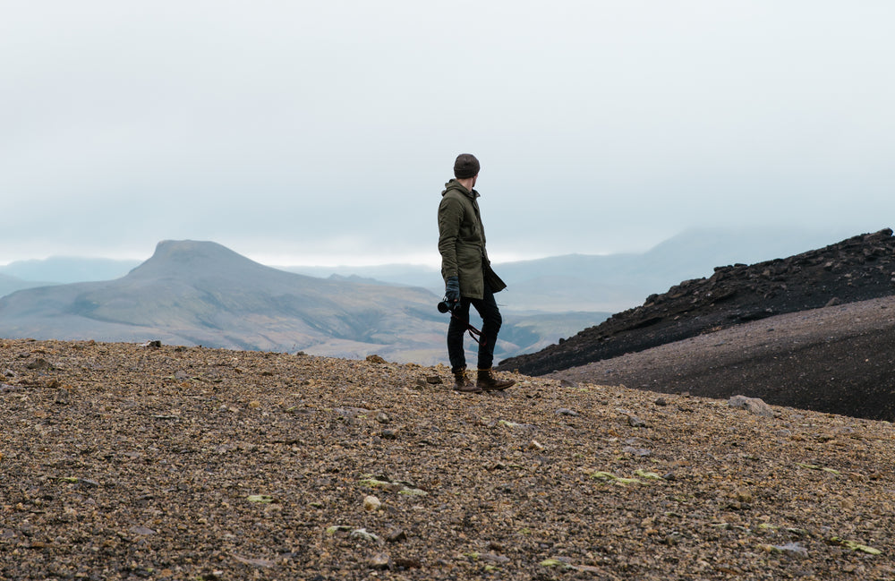 hiker in rocky iceland field