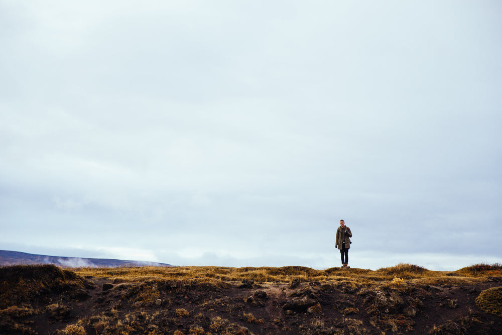 hiker stops near edge