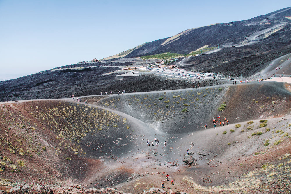 hikers explore volcanic hills