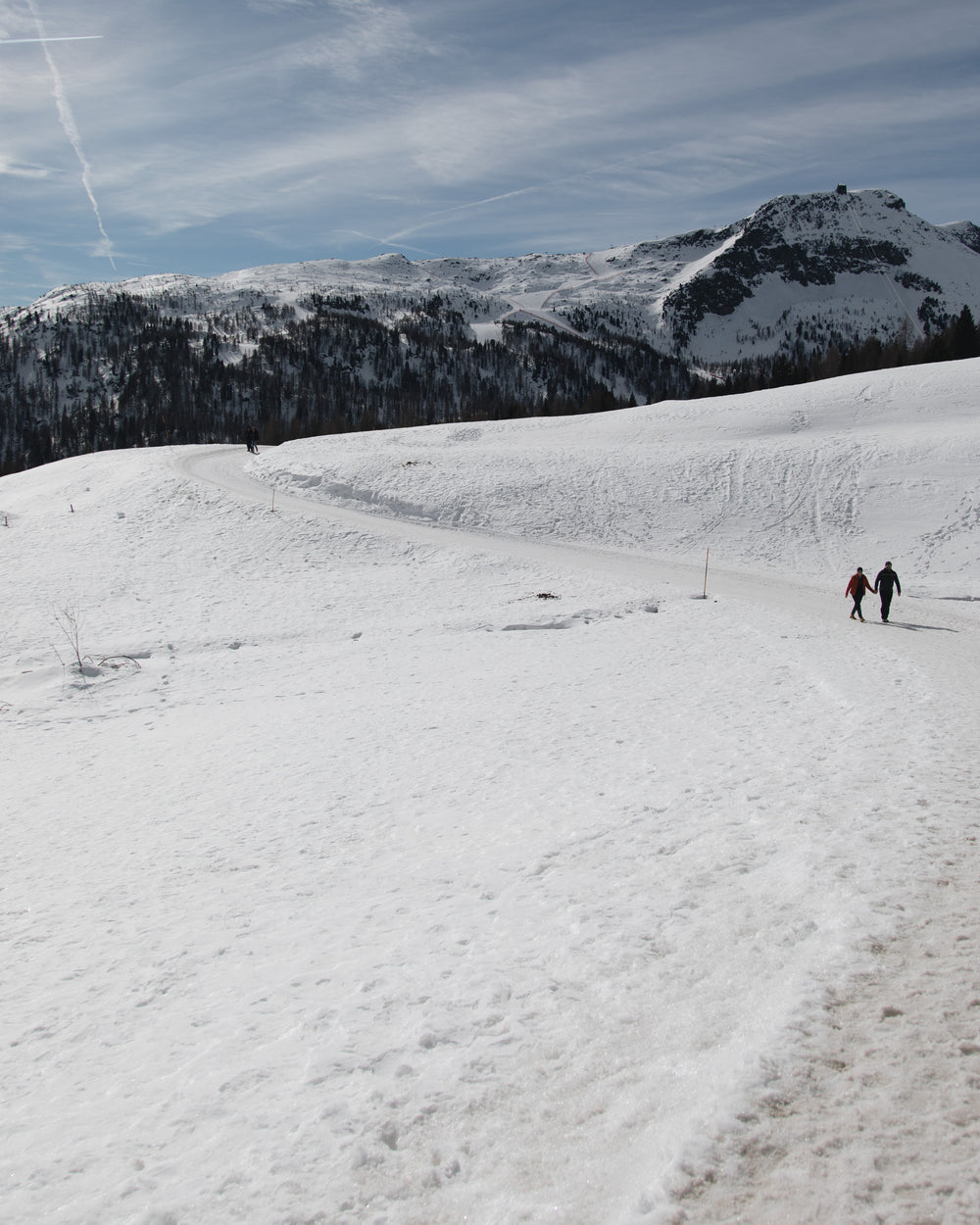 hikers on a snow trail