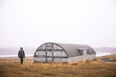 hiking abandoned quonset in field