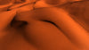 Hills Of Vibrant Orange Sand And Wavy Texture