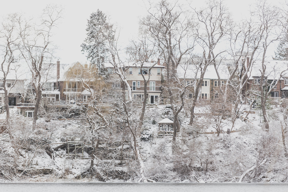 hillside homes dusted with snow