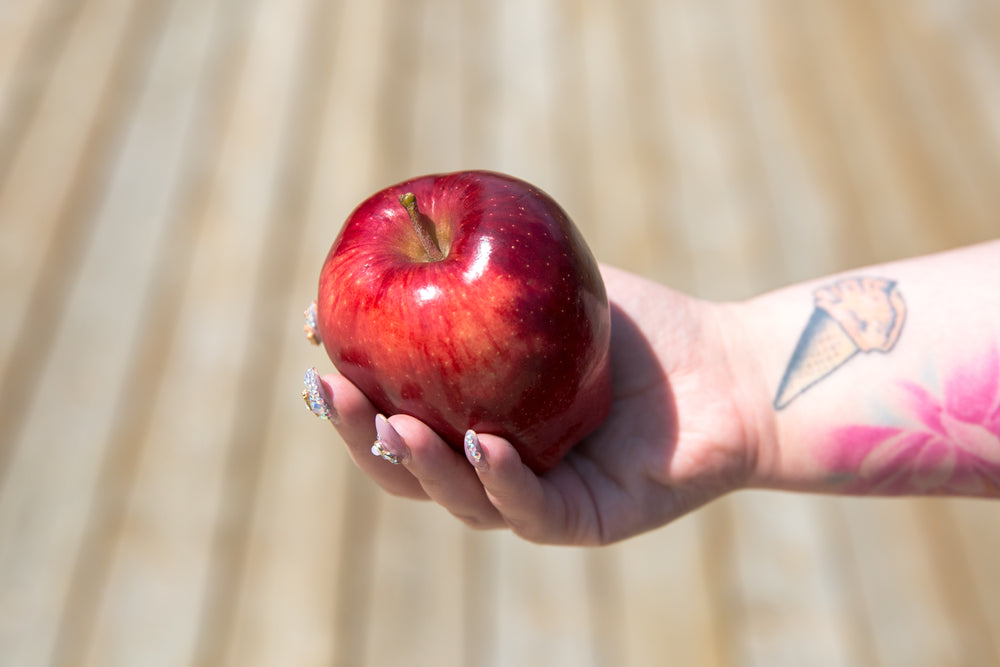 holding an apple
