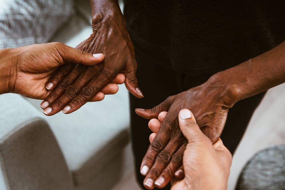 holding grandma's hands